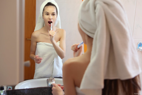 Russian young sweetie Leona Mia loses her towel & flaunts her petite body