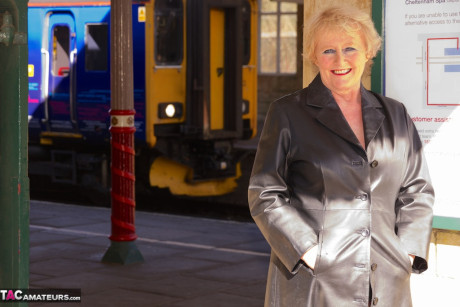 Grandma Claire Knight wears a coat with nothing but cute lingerie underneath