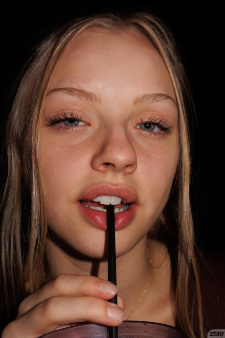 Attractive babe Kylie Shay shows off her giant ass in a pretty striptease