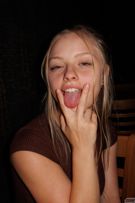 Attractive babe Kylie Shay shows off her giant ass in a pretty striptease