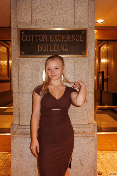 Attractive babe Kylie Shay shows off her giant ass in a pretty striptease