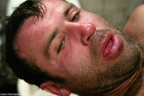 Penny Flame and her friend invite a male slave to orgasm in a bathroom