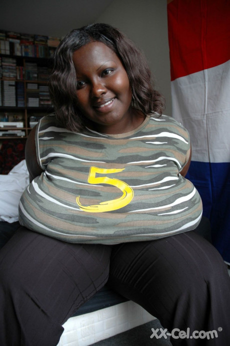 Wide ebony girl Mariana Kodjo showing off her gigantic natural titties