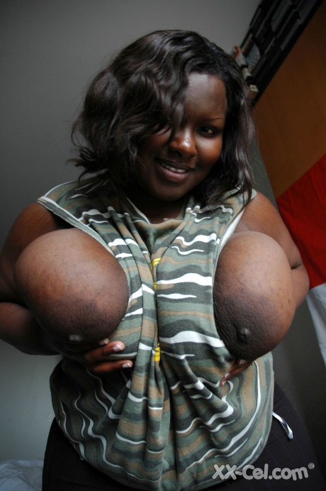 Wide ebony girl Mariana Kodjo showing off her gigantic natural titties