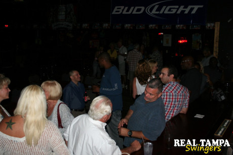 Horny matures with giant juggs flaunt their bosoms in a night club