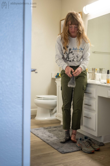 Blonde amateur shows her giant behind & her small boobs while getting dressed