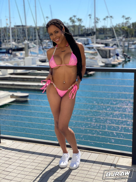 Curvy black Kira Noir exposes her firm fake tits before a blowjob & monstrous facial