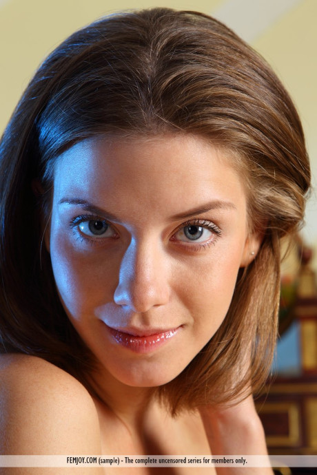 Naughty Danica sheds white dress to pose naked offering hard nipple closeup
