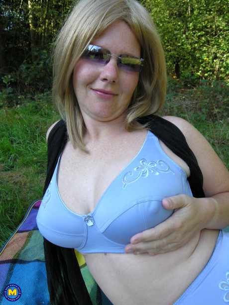 Hot older with enormous juggs and enormous butt Mirabelle toys her vagina outdoors