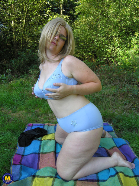 Hot older with enormous juggs and enormous butt Mirabelle toys her vagina outdoors