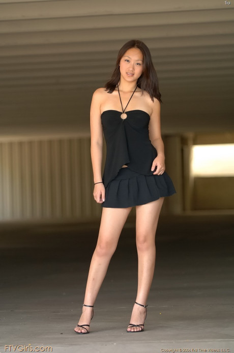 Shy chinese babe Tia screwing her innocent snatch with a red toy in public
