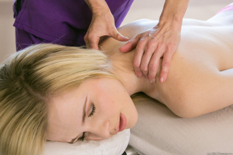 Redhead masseuse Veronica Avluv plays with lesbian clients on massage table