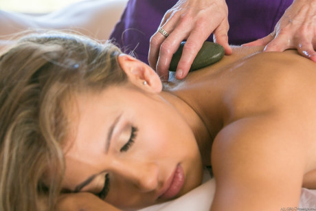 Redhead masseuse Veronica Avluv plays with lesbian clients on massage table
