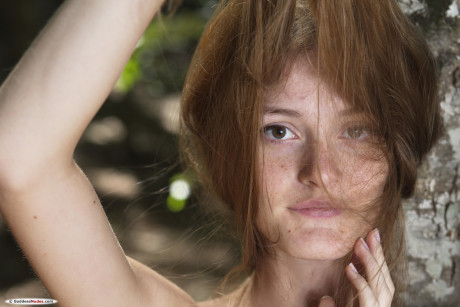 Babe with a slim figure Chova flaunts her tiny breasts and booty in the woods