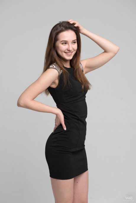European beauty Milana removes her ebony dress to show her amazing figure
