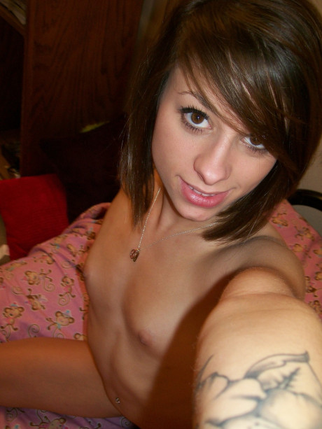 Amateur babe Riley gets rid of her shirt and panties before posing undressed