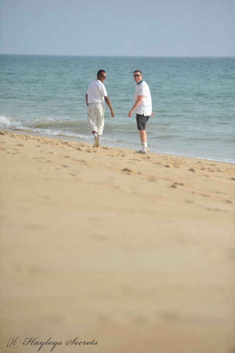 Hayley Marie Coppin and her thick girl go bare-breasted at the beach in sunglasses