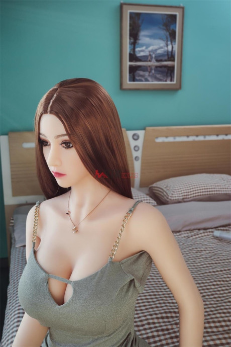 Ravishing chinese sex doll shows her flawless stacked body in a sweet dress