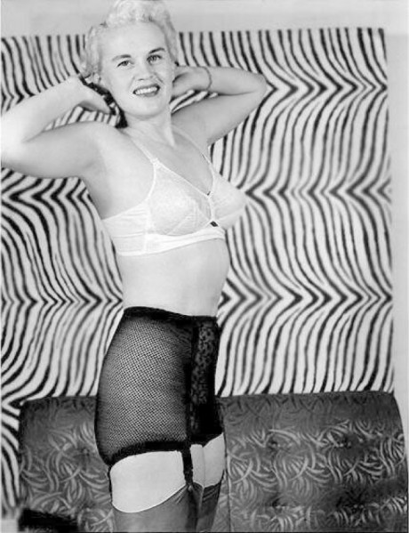 Models of yore removing bras and girdles to flaunt their stuff in vintage porn