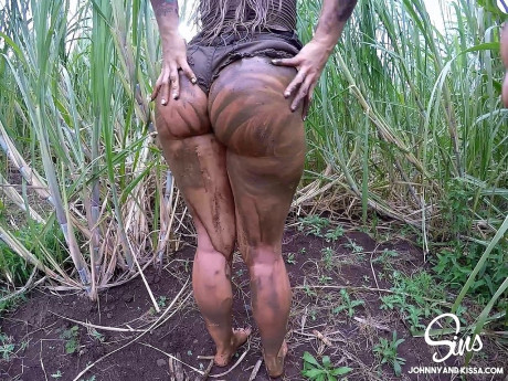 Busty bitch GF woman Kissa Sins and her boy have sex on muddy ground