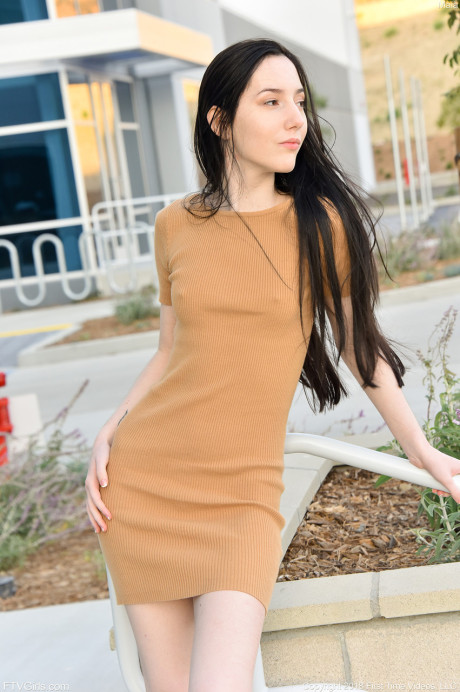 Glamour babe Maia showing her tiny breasts & spreading her trimmed cunt outdoors
