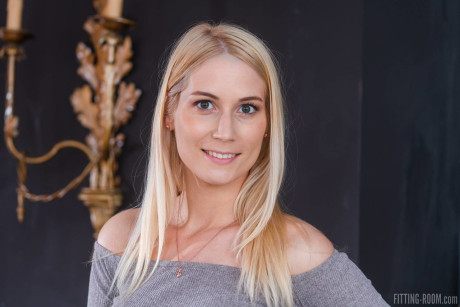 Blonde teen Sharon White unveils her pretty butt before masturbating