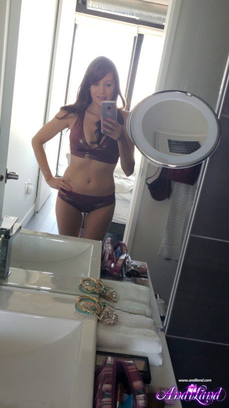 Young amateur Andi Land takes naked and undressed self shots