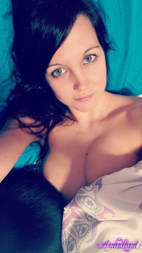 Young amateur Andi Land takes naked and undressed self shots