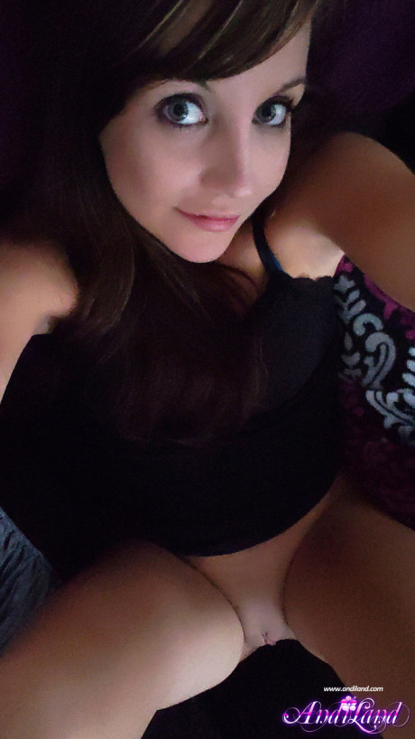 Young amateur Andi Land takes naked and undressed self shots