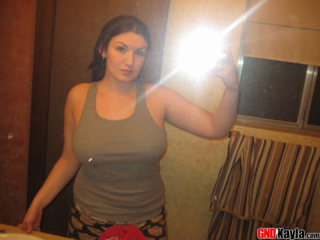 Amateur solo whore gf girl takes mirror selfies of her monstrous melons