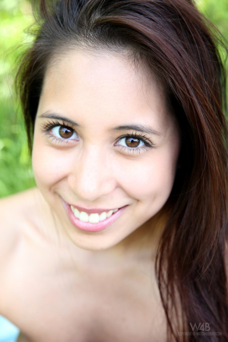 Long-haired teen cutie Paula Shy shows her cute tits & tight holes outdoors