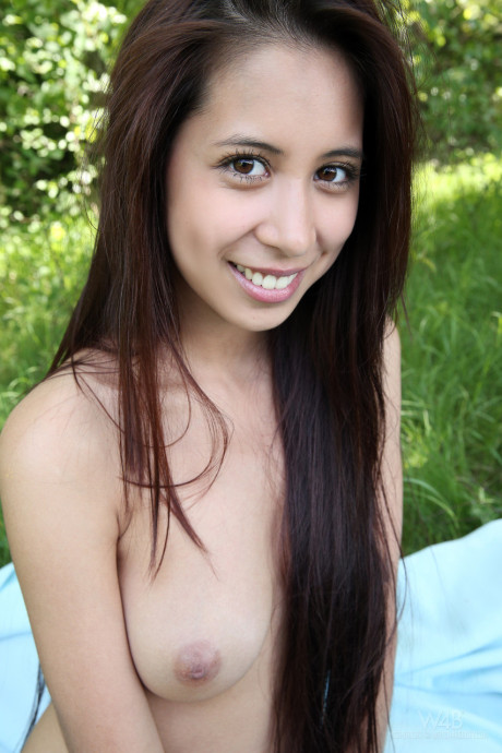 Long-haired teen cutie Paula Shy shows her cute tits & tight holes outdoors