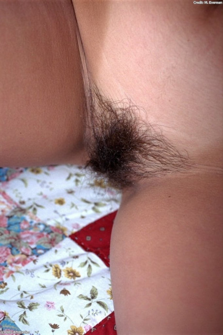 Brunette Gloria shows off her juicy melons and spreads her hairy coochie
