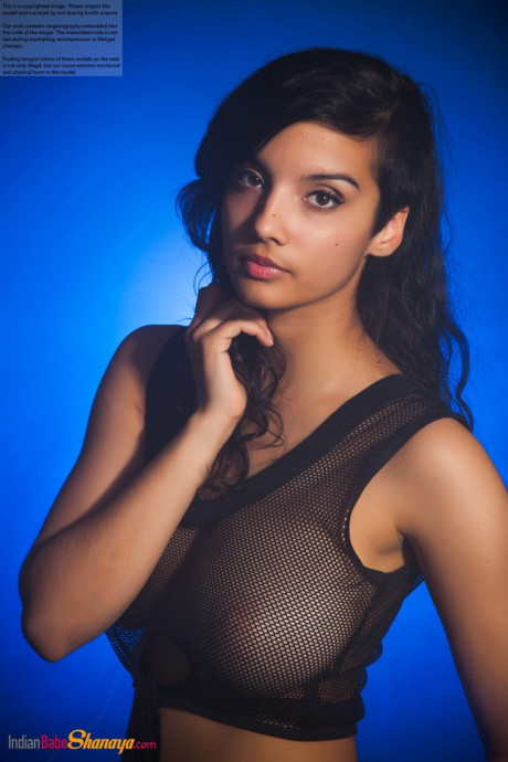 Indian female models non naked in a see thru top and shorts