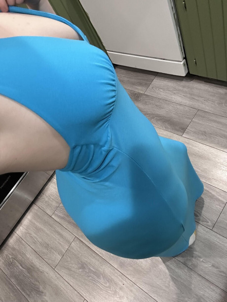 Amateur bitch girl lady looses her firm boobies from a blue dress in a galley