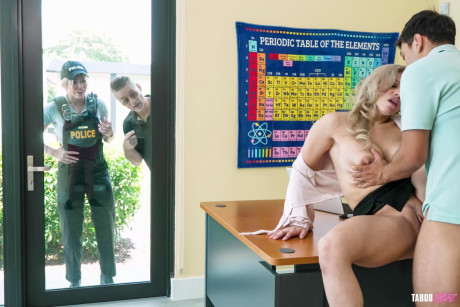 Cory Chase and Lory Lace get banged in the behind over a teacher's desk