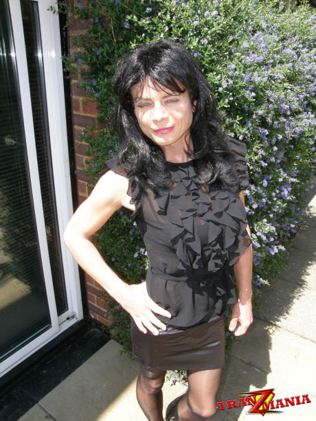 Filthy dark haired crossdresser enters the house then masturbates her hard