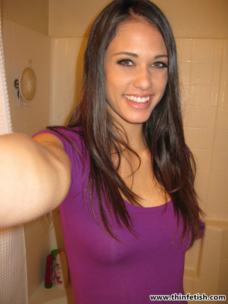 Petite slut gf woman Tiffany Thompson takes naked selfies in a bathroom mirror