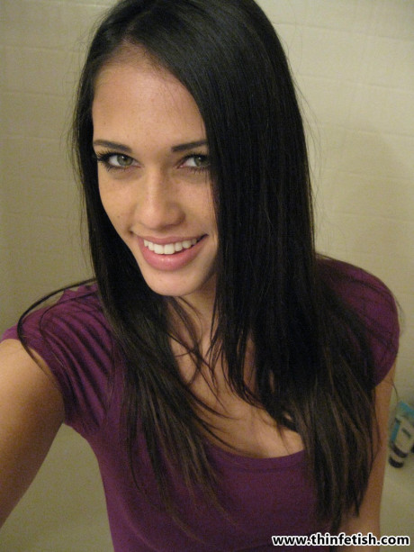 Petite slut gf woman Tiffany Thompson takes naked selfies in a bathroom mirror