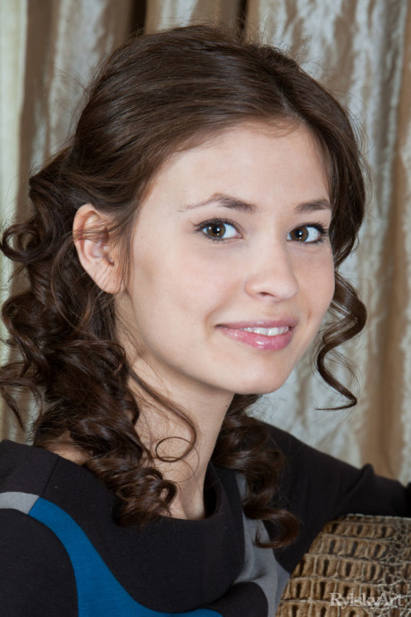 Cute teen Irina J poses her petite body showing her tight muff up close
