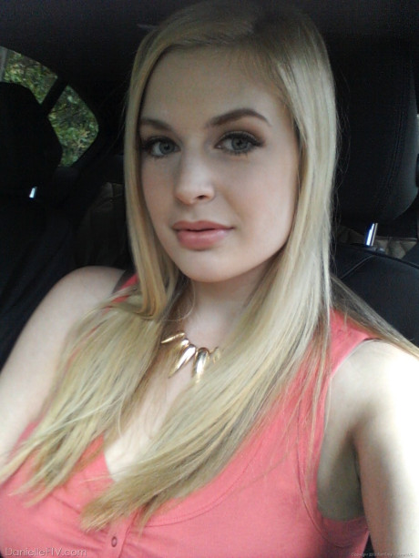 Large boobed amateur is joined by a girlfriend during one of her self shots