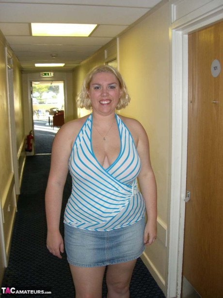 Mature blonde Barby swallows off a penis after getting undressed in a hotel room