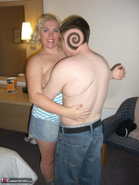 Mature blonde Barby swallows off a penis after getting undressed in a hotel room