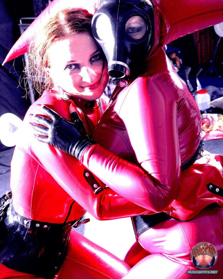 Fetish models Darkwing Zero and lady girl Cassandra hug at the end of a shoot