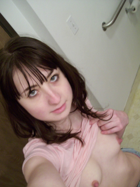 Amateur skank girl girl shows her hard nips and touches her cunt in homemade action