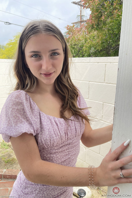 Ravishing teen Macy Meadows shows her tiny tits and presents her cunt