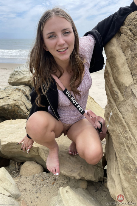 Ravishing teen Macy Meadows shows her tiny tits and presents her cunt