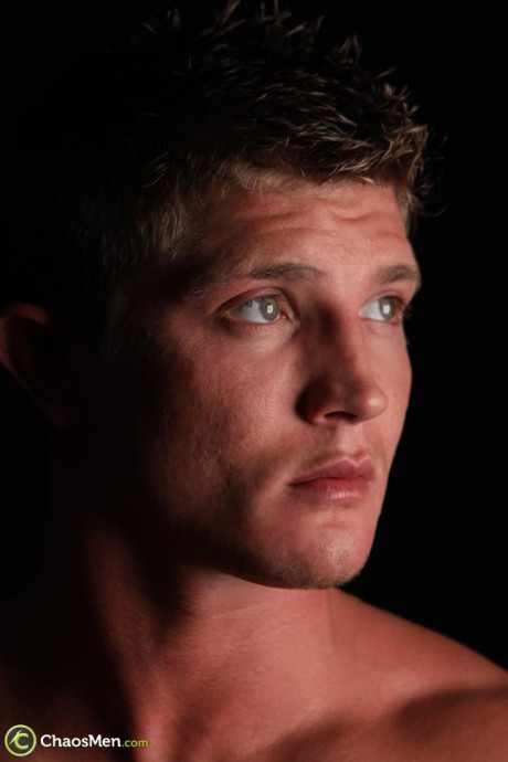 Muscular gay stud Sinclair flaunts his strong naked body & his hard meat