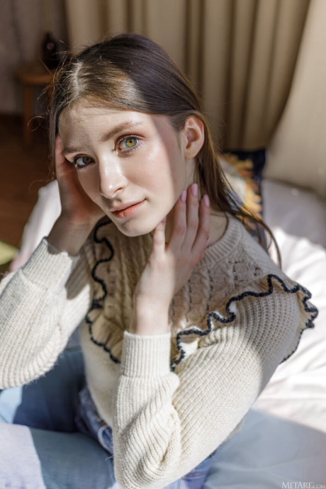 Beautiful young girl gf lady with long hair gets totally undressed on her bed