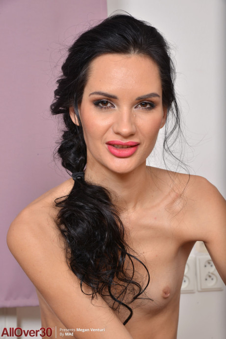 Lusty Ukrainian Megan Venturi loses her see-through outfit and poses nude